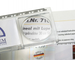 Lineal mit integrierter Lupe